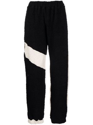 Bethany Williams fleece-texture two-tone trousers - Black