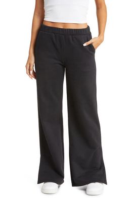 Beyond Yoga On The Go Wide Leg Flare Pants in Black