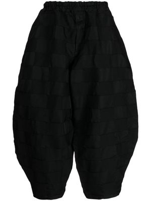 Black Comme Des Garçons elasticated-waist cropped trousers