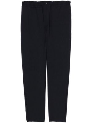 Black Comme Des Garçons elasticated-waist wool trousers