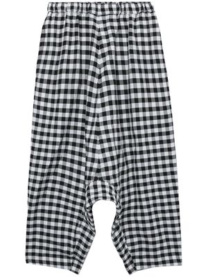 Black Comme Des Garçons gingham-print drop-crotch trousers