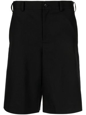 Black Comme Des Garçons knee-length tailored shorts