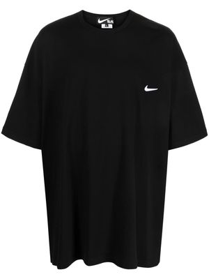 Black Comme Des Garçons oversized Swoosh-logo T-shirt