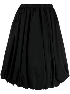 Black Comme Des Garçons pleated midi skirt