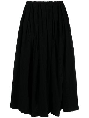 Black Comme Des Garçons pleated wool skirt