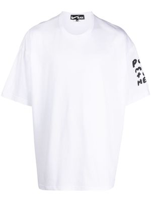 Black Comme Des Garçons slogan-print T-shirt - White