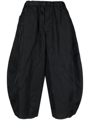 Black Comme Des Garçons wide-leg cropped trousers
