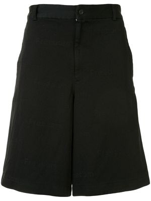Black Comme Des Garçons wide-leg shorts