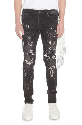 BLUECARATS The McQueen Ripped Stretch Slim Tapered Leg Jeans in Repaired Black