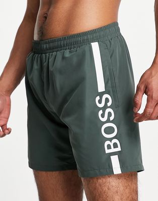 BOSS Dolphin bold logo swim shorts in khaki-Green
