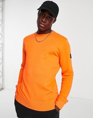 BOSS Walkup 1 rubberized sleeve logo sweatshirt in orange