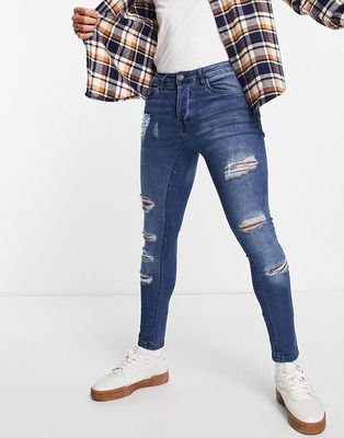 Brave Soul skinny fit jeans with extreme rip in mid blue