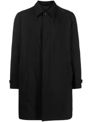 Brioni concealed-fastening cotton trench coat - Black