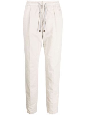 Brunello Cucinelli pleated tapered-leg trousers - Neutrals