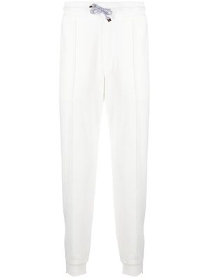 Brunello Cucinelli tapered cotton track pants - White