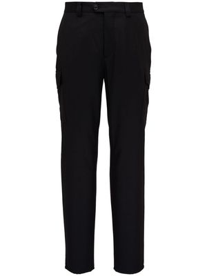 Brunello Cucinelli virgin-wool tapered trousers - Black