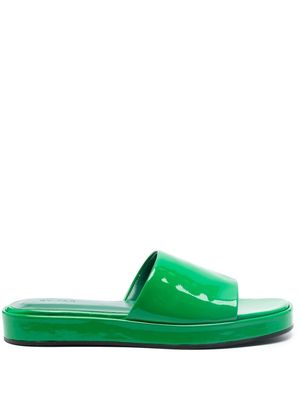 BY FAR Cala patent-finish mules - Green