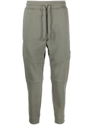 C.P. Company Lens-detailed tapered track pants - Green