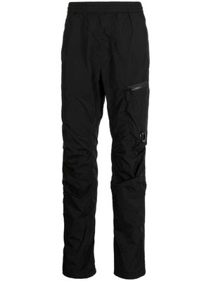 C.P. Company logo-appliqué tapered trousers - Black