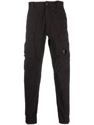 C.P. Company logo-patch tapered trousers - Black
