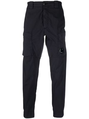 C.P. Company logo-patch tapered trousers - Blue