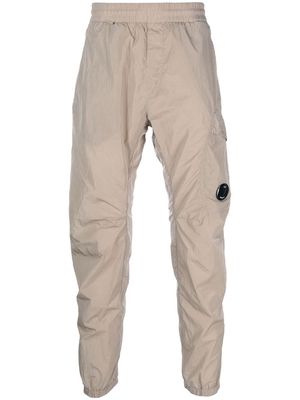 C.P. Company logo-plaque tapered trousers - Brown