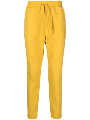 C.P. Company logo-print stretch-cotton track pants - Yellow