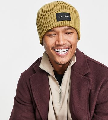Calvin Klein ASOS exclusive beanie with rubber patch in camel-Neutral