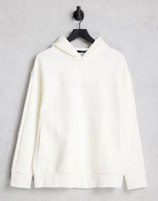 Calvin Klein comfort debossed logo hoodie in cream-White