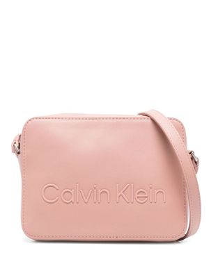 Calvin Klein embossed-logo crossbody bag - Pink