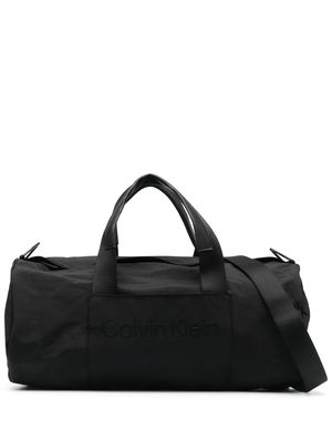 Calvin Klein embossed-logo holdall bag - Black