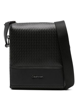 Calvin Klein embossed monogram-pattern messenger bag - Black