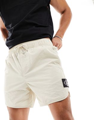 Calvin Klein Jeans cc badge logo shorts in beige-Neutral
