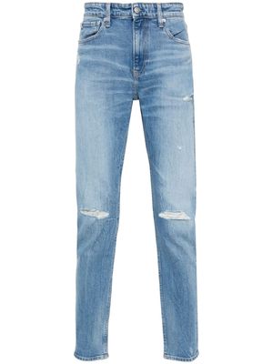 Calvin Klein Jeans distressed tapered-leg jeans - Blue