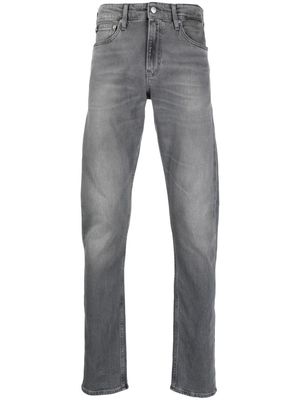 Calvin Klein Jeans logo-patch mid-rise slim-fit jeans - Grey
