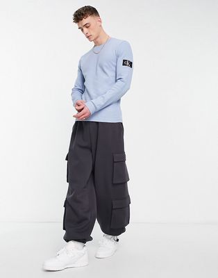 Calvin Klein Jeans monologo badge waffle slim fit long sleeve top in light blue