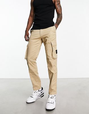 Calvin Klein Jeans skinny washed cargo pants in beige-Neutral