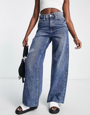 Calvin Klein Jeans super high rise raw hem wide leg jeans in mid wash-Blue