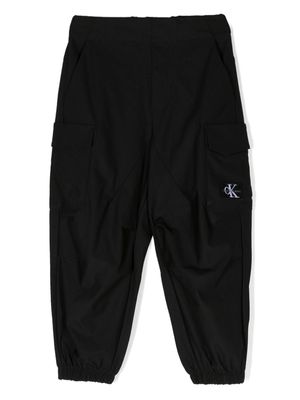 Calvin Klein Kids logo-patch tapered trousers - Black