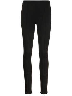 Calvin Klein logo-embroidered cuff-zip leggings - Black
