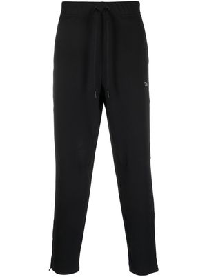 Calvin Klein logo-embroidered tapered track pants - Black