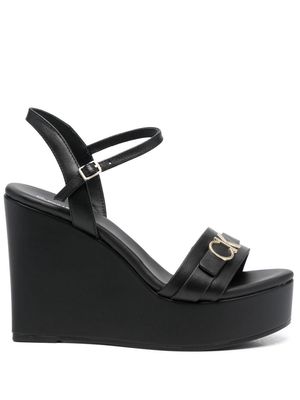 Calvin Klein logo-lettering platform wedge sandals - Black