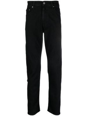 Calvin Klein logo-patch mid-rise slim-cut jeans - Black