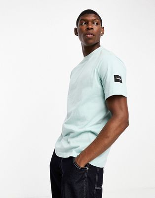 Calvin Klein logo tape collar and side patch t-shirt in green