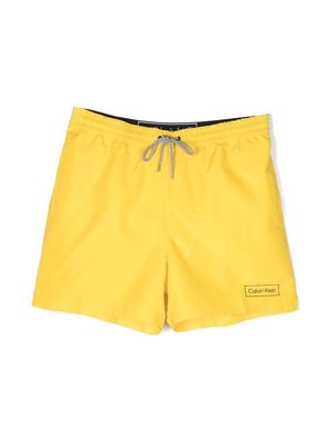 Calvin Klein logo-waistband swim shorts - Yellow