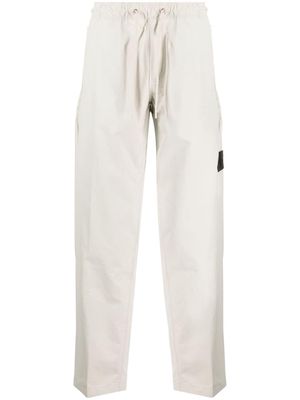 Calvin Klein Technical logo-appliqué trousers - Neutrals