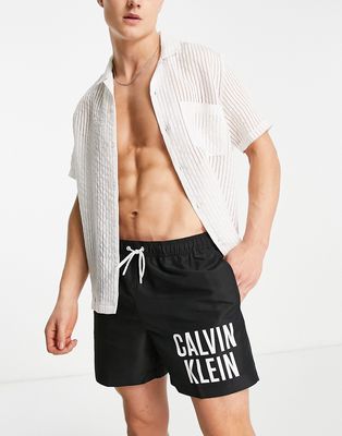 Calvin Klein thigh logo swim shorts in black