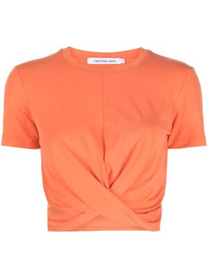 Calvin Klein twisted short-sleeve crop top - Orange