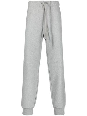 Carhartt WIP embroidered-logo cotton trackpants - Grey