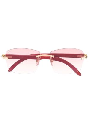 Cartier Eyewear rimless rectangle-frame sunglasses - Red